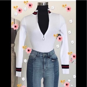 White bodysuit with blue and red stripes